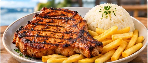 Grilled pork chop with rice and chips
